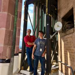 William Pugh and Caleb Rheal of Top Rung Tower Chime & Organ Service at the city hall of Asheville, North Carolina (photo credit: Eric Johnson)