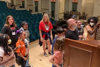 Sean Vogt demonstrates the Ruffatti organ to Organ Discovery Days participants