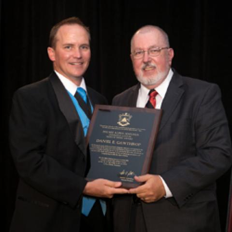 Daniel Gawthrop accepts his award from Phi Mu Alpha President Mark Lichtenberg 