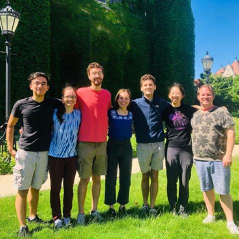 Six of the eight new carillonneurs: João Shida, Erika Anderson, Noah Kravitz, Kayla Gunderson, Carson Landry, and Michelle Lam with Jeremy Chesman